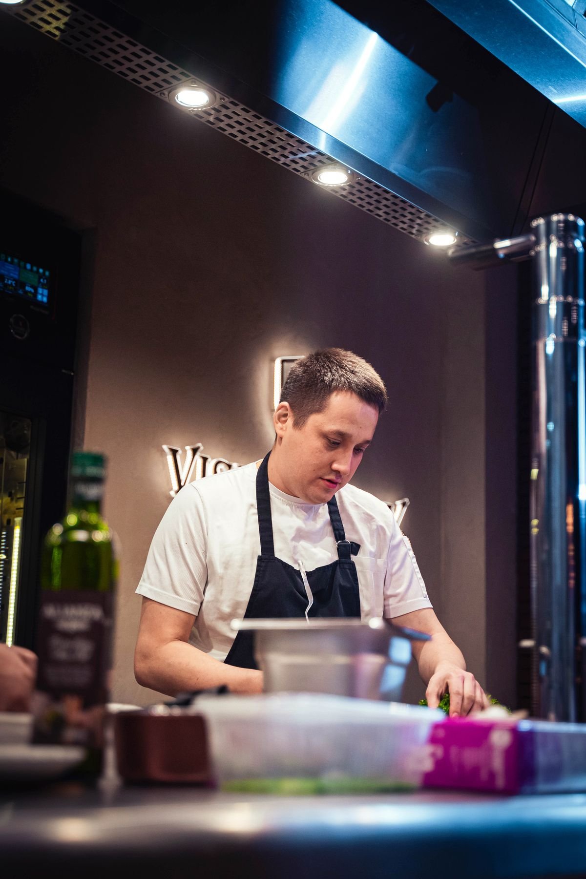 Chef preparing food in a restaurant kitchen