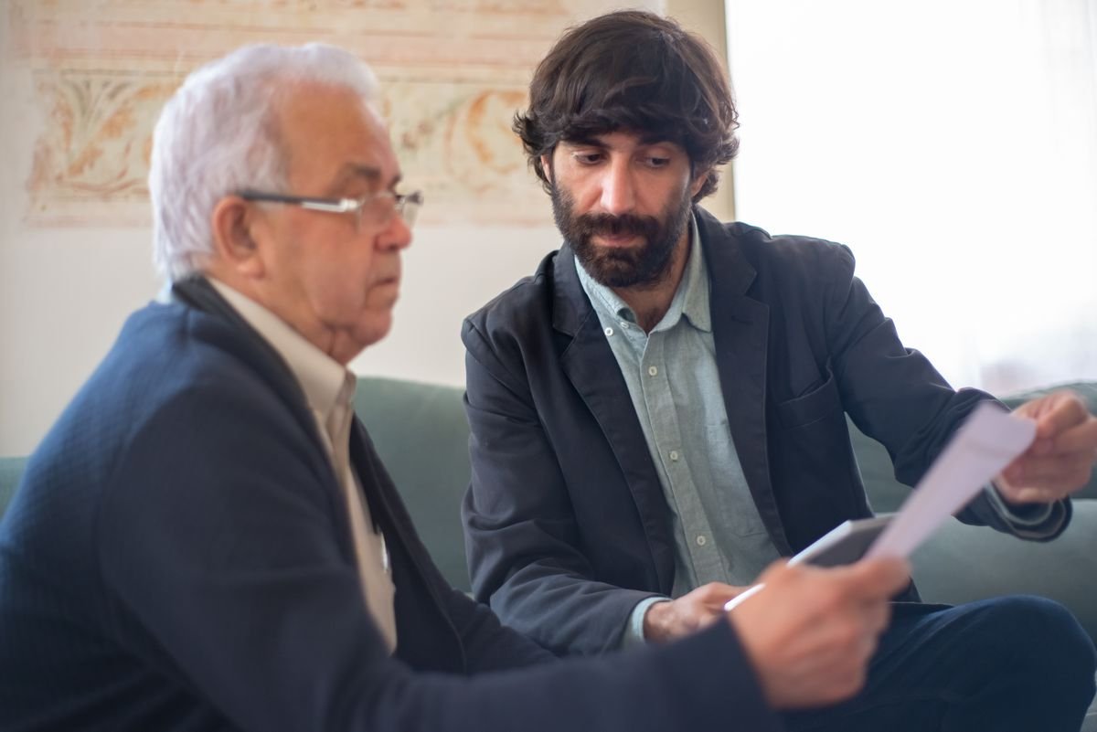 Professional adviser reviewing documents with a client